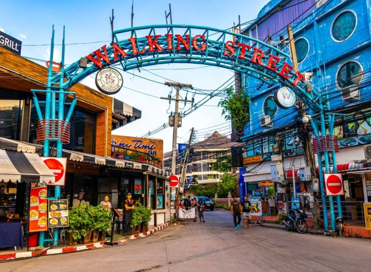 Walking Street entrance archway with shops and cafes, Pattaya, Thailand